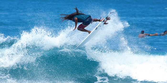 Prominent Jupiter surfer Jensen Callaway grabs some air during one of the Aguadilla trips sessions